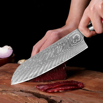 Santoku Damastmesser 7 Zoll schneidet Fleisch auf Holzbrett, hochwertige Küchenutensilien